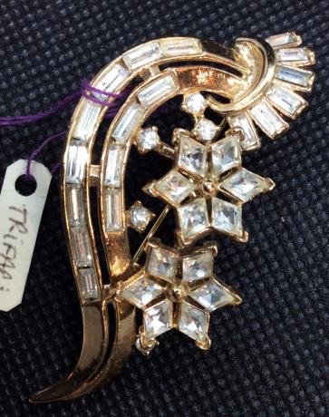 Vintage TRIFARI Crystal Brooch Pin, c. 1940: Labeled TRIFARI by former antique store in Upper Westchester, NY, where acquired. Baguette Chanel crystals, diamond shape crystals created in floral/ star motif. Vintage TRIFARI costume jewelry, 2.5 x