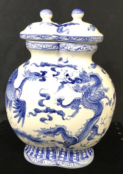 Japanese Porcelain Dragon-ware Ginger Jar: Blue & White Dragon Motif Vase with Lid. Underside has blue stamp in circle under the glaze, with various symbols .Additional sticker in red with diamond shape logo and Japanese / Asian character writ