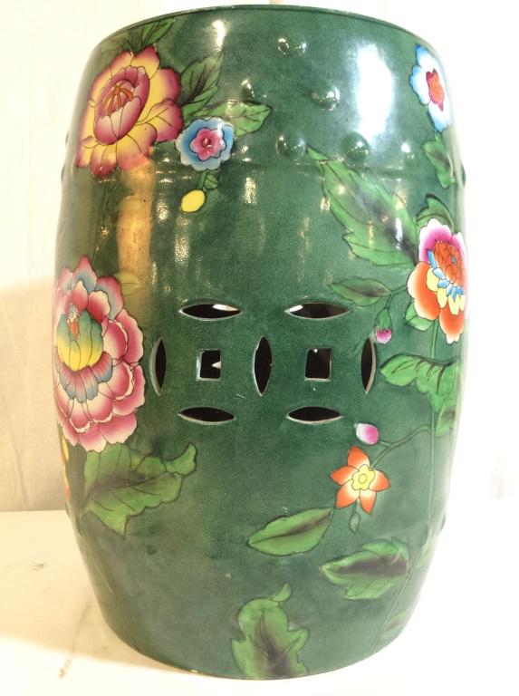 Signed Porcelain Hand Painted Garden Stool: Singed with asian characters. Underside of garden stool is marked. Garden stool is green toned with multi toned floral & leaf detail. Piece appears to be hand painted. Garden stool, Asian garden stool
