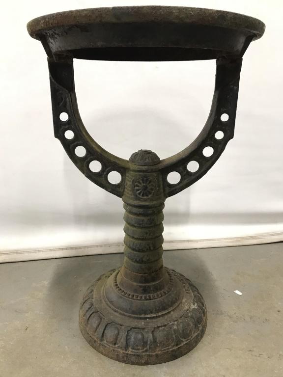 Vintage Outdoor Metal Plant Stand / table Base: Table base is vintage. Piece is black toned and metal. Pieceis circular at top and base. Piece measures approx 22 inches tall 14 inches wide. Piece has evident weathering. garden stool, plant stand, i