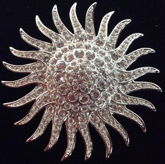 JBK Rhinestone Star Burst / Sun Burst Brooch: 3 in. diameter. Sun/Starburst design. Polished metal lining. Signed on reverse JBK. Brooch, Crystal Brooch, Bling Brooch, Fashion Accessory, JBK Designer Pin, Wearable Accessory, Silver Tone & Rhinest