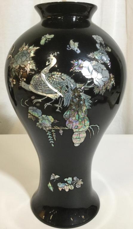 Signed Korean Lacquer Ware Mother Of Pearl Vase: This piece is a Korean Lacquer Ware Vase. The relief detailing is crafted from nacre / mother Of pearl. The detailing depicts a pair of peacocks among flowers. The piece is possibly vintage, and possi