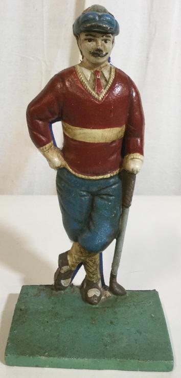 Vintage Handpainted Cast Iron Golfer Doorstop: This piece is a vintage cast iron Doorstop, the piece has been cast and painted to resemble a golfer. The reverse side is lined with felt. The piece is Hand Painted. The piece measures approx 10 inche