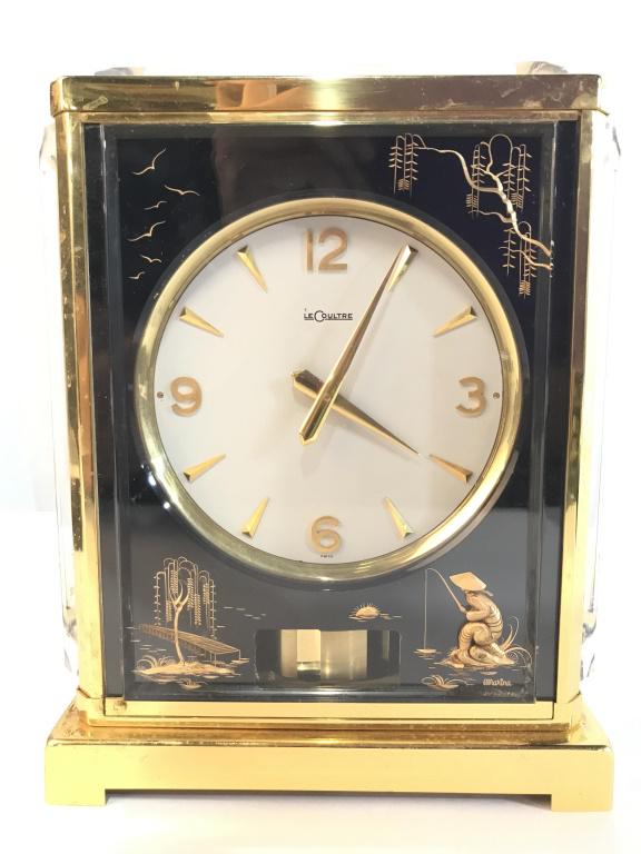 Rare LeCoultre Chinoiserie Marina Model Swiss Cloc: Clock was limited in production Le Coultre Swiss clock with½" thick intaglio beveled panels, this model is referred too "Chinoiserie Marina" signed on front panel "MARINA". Clock is black toned with 