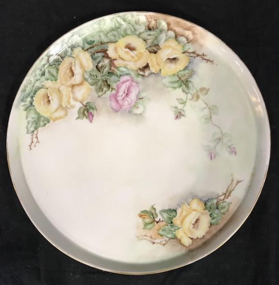 Vintage T & V Limoges France Hand Painted Platter: Vintage T & V Limoges France Hand Painted Platter with hand painted pink and yellow rose motif, marked on underside Wilson T&V Limoges France, wear to gold toned painted rim, measures approximately 11