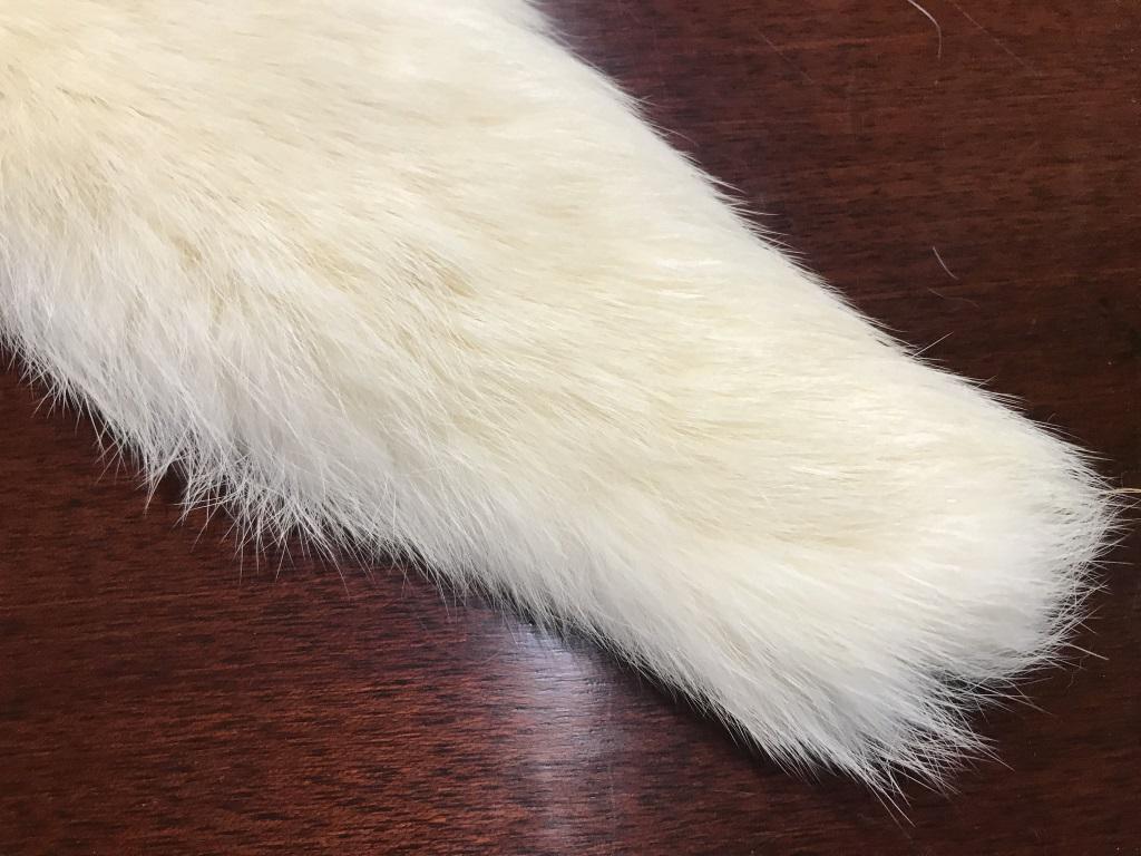 Vintage Fur Stole Collar: Possibly Rabbit. Cream color. App 5 in. at Wideest .. 41 in. long. Underside in vintage condition with sateen like lining, hand stitched. Needs sewing repair for attachment purposes. Fur Stole, Fur Co