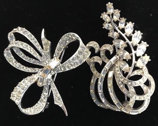 Lot 2 Clear Rhinestone Art Nouveau Style Brooches: Brooch 1 bow style with channel set baguettes at center. 2 x 2 in. Brooch 2 Organic floral with channel set baguettes, marquis and faceted rounds. 2 1/4 x 1 1/4 in. Rhinestone Brooch, Rhinestone Pins,