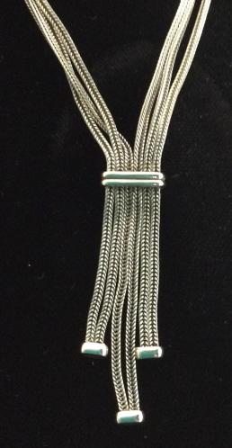 Sleek Multi Snake Chain Necklace: Silver Toned Metal Of 3 strands clasped together with simple polished accent that forms a dangle pendant look. 14 in. Pendant length 1.5 in. Lobster Clasp. Snake Chain, Choker, Necklace, Silver Tone C