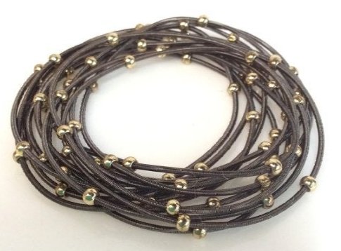 Set 12 Stackable Bracelets, fashion jewelry: Dark toned metal spring bracelets with gold tone accent beads. 2 pair are connected, otherwise all bracelets are individual. Fashion Accessory, Stackable Bracelets, Wearable Fashion, ladies vintage es