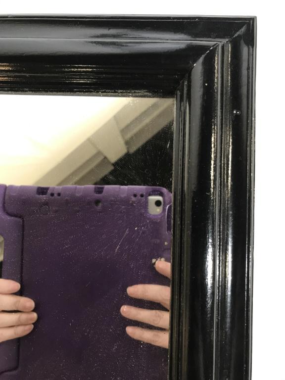 Vintage Black Lacquer Wood Wall Mirror: Rectangle shape, 2 in. wide molding, corners for together nicely, no paint chipping, backside has ripped paper, appears to have water stains on back cardboard. Frame has one nick. Mirror nailed in, si