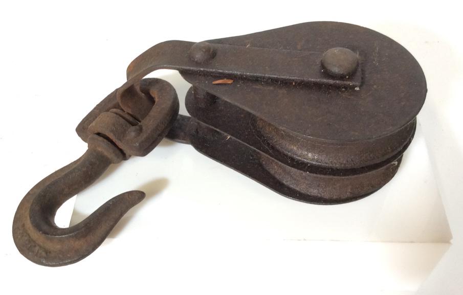 Vintage Iron Pulley & Hook: The piece is a vintage, possibly antique, pulley and hook. The measures approx 10.75 inches H and 2.12 inches W. The piece shows wear due to use and age. Iron works, vintage collectible, antique colle