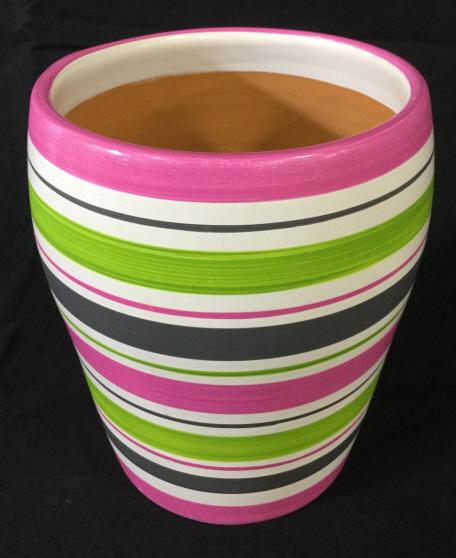 Hand Painted Decorative Earthenware Vase, Peru: This piece is a decorative vase, stoneare pottery, The piece measures approx 8 inches H, and 6 inches in diameter. The piece has been colored in pastel tones of lavender, Rose, and lime green colors o