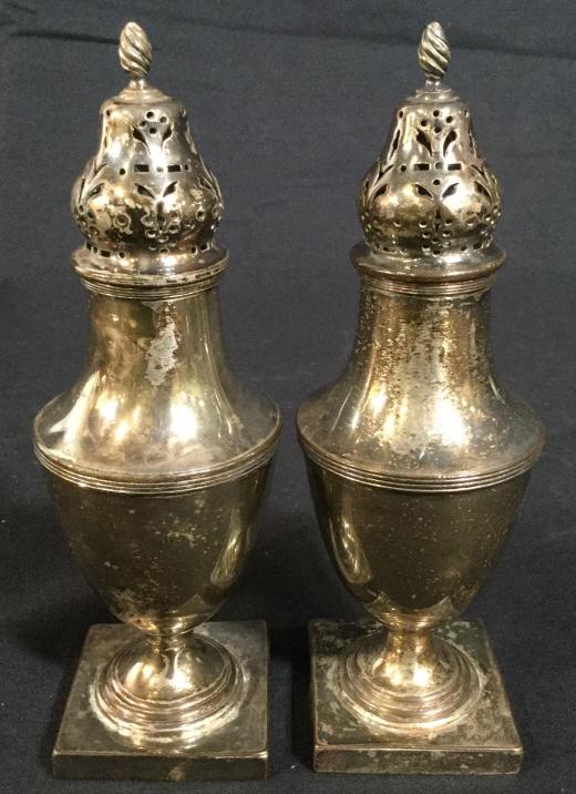 Pair Vintage Silver Plated Salt & Pepper Shakers: This is a pair of salt and pepper shakers, the pieces are silverplated, Possibly silverplating on Copper. The pieces are vintage, possibly antique. Each piece measures approx 6.75 inches H and 2.12 in