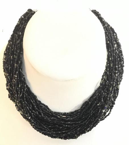 Multi Strand Seed Bead Choker: Black beads, 1 mm tubular, 2 sets of multi strands with decorative silver tone filigree accessory, hook clasp. App 13.5 in. Necklace, Choker, Lightweight Beads, Multi Strand, Black, Fashion Jewelry, W