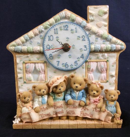 CHERISHED TEDDIES Wall Mounted Clock: This piece is a Wall Clock, it’s is part of the CHERISHED TEDDIES line of collectibles by ENESCO. The piece is numbered 156604. The piece is sculpted from ceramic. The piece measures approx 6.4 inch