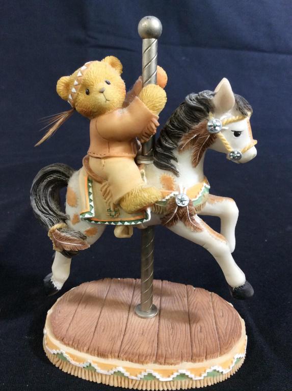 CHERISHED TEDDIES Cody Carousel Ceramic Figure: The label reads: Cherished Teddies, Cody. A registration number on the bottom reads 842/818. The number on the box and figure reads 505498. The piece has been crafted from ceramic. The piece measures 