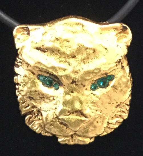 Rhinestone Eye Tiger Pendant Necklace, Jewelry: Repousse Tiger face in bright gold tone finish with green tone rhinestone eyes. Pendant 1 x 1 in. on adjustable cord, 16-18 in. Lobster clasp. Cats of Prey, Tiger Pendant, Asian Tiger Jewelry, Cord Ne