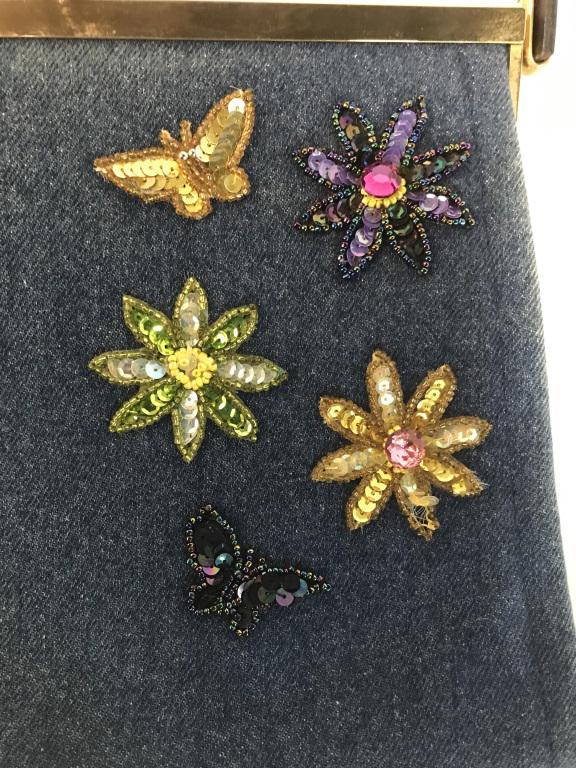 Vintage Blue Jean Crafted Purse, MENA NY: Hand Crafted hard form vintage purse. Exterior material is blue jeans with sewn sequins and beads into flowers and butterflies. Button snap closure. Interior with label MENA New York. Handle hangs 10