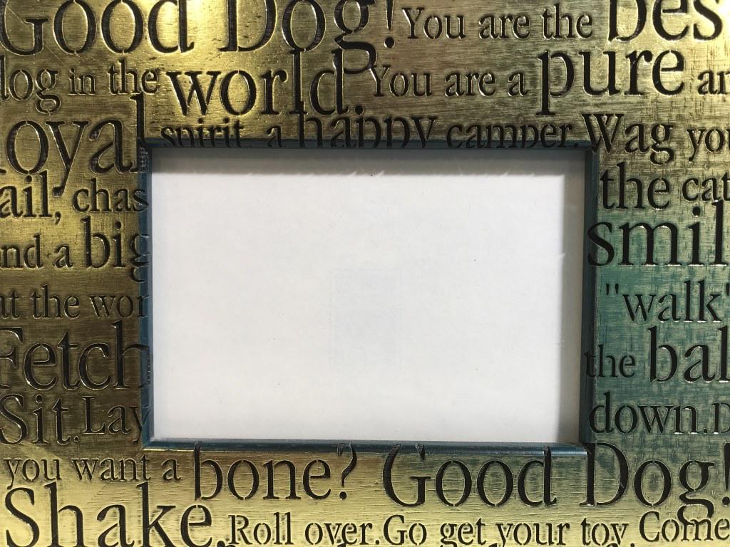 Lot 3 Wooden Picture Frames: This is a lot of 3 wooden picture frames. The brands include CRAFT INC. and EXPOSURES. One of the Frames has been painted in gilt paint and has dog related phrases carved into it. The largest piece me