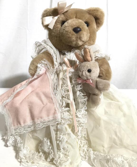 BEARLY PEOPLE Bedtime Stuffed Teddy Bear: This is a Stuffed teddy bear from BEARLY PEOPLE. The piece depicts a young bear wearing a nightgown and clutching a stuffed bunny, the bear is also wearing bunny slippers. The piece measures approx 12