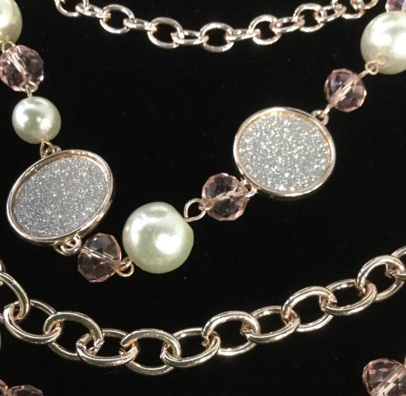 Ellen Tracy Necklace & Earring Jewelry Set: New. N vervworn. Original label. All in rose gold toned metal. 3 strand adjustable necklace with costume pearls and pink faceted beads. Shiny round disc beads with silver sparkle. Match8ng dangle earr