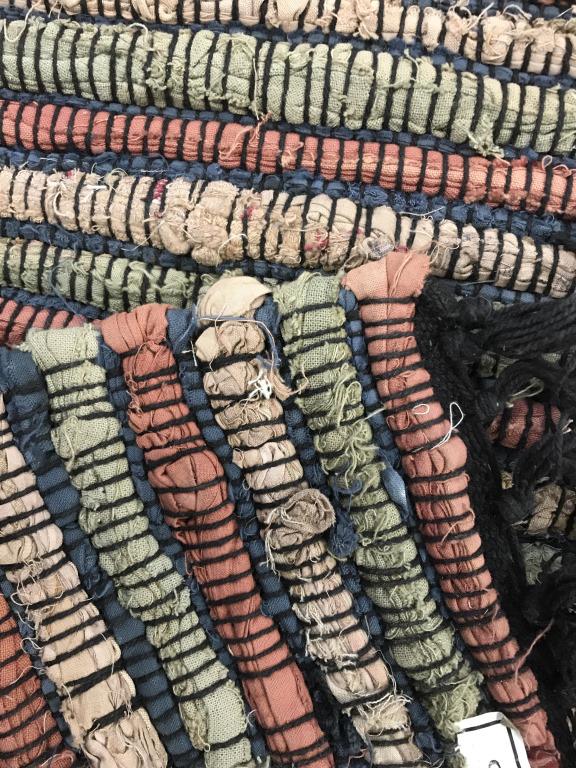 Vintage Multi Toned Fringed Rug: Rug contains tones of magenta, pink, slate & blue. Rug is possibly hand hooked. Rug has black toned fringes. Rug, carpet, area rug, fringed rug,multicolored rug. Piece measures approx 92 inches long 6