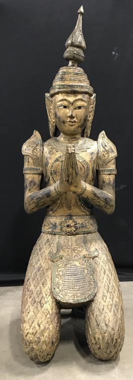 4 Foot Tall Kneeling Gold Leafed Buddha Statue: Gold Leafed Carved Wooden Buddha Statue with sequined and raised scroll pattern design, statue stands on pedestal base, measures approximately 4 foot 1.5 inches tall x 15 inches wide x 18 inches deep,