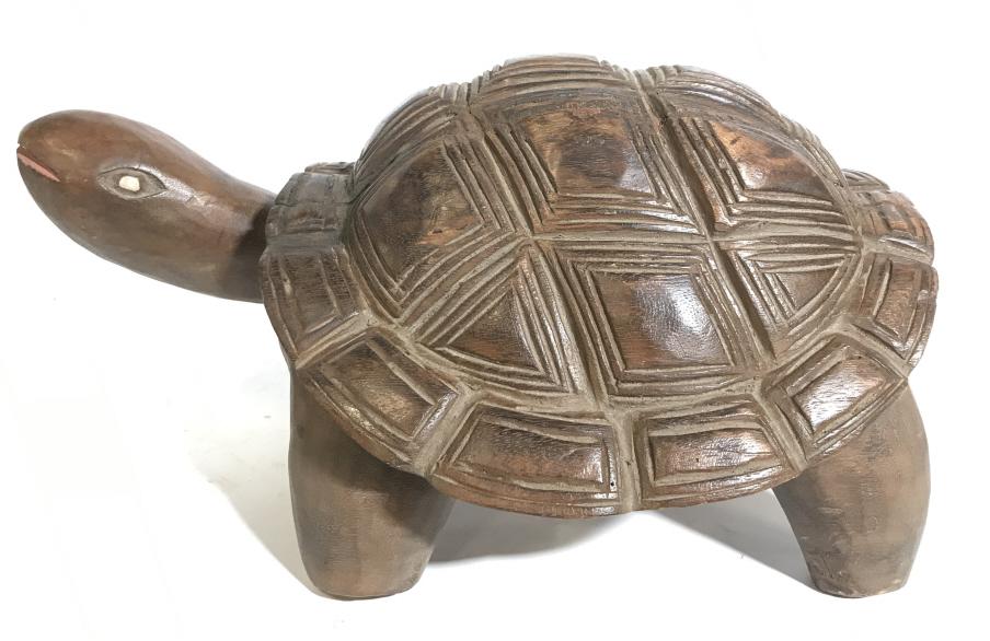 Floor Size Vintage Wooden Turtle Sculpture, Ghana: This is a wooden turtle statue, the piece originates from Ghana in West Africa. The piece measures approx 7.5 inches H, 9 inches W, and 14 inches long. The piece is vintage, possibly antique. The piec