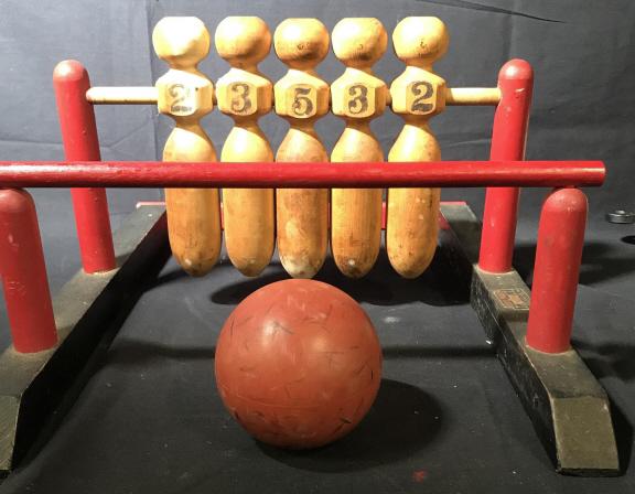 Collectible Vintage Mansfield-Kuhn 5 Pin Bowling: Wooden Bowling Game ‘Five Pins’ by manufacturer Mansfield-Kuhn Mfg. Co., Cuyahoga Falls, OH, USA. Original label on piece. Possibly dates to 1940’s. Includes bowling ball. Pins are 9.5 in. tall.