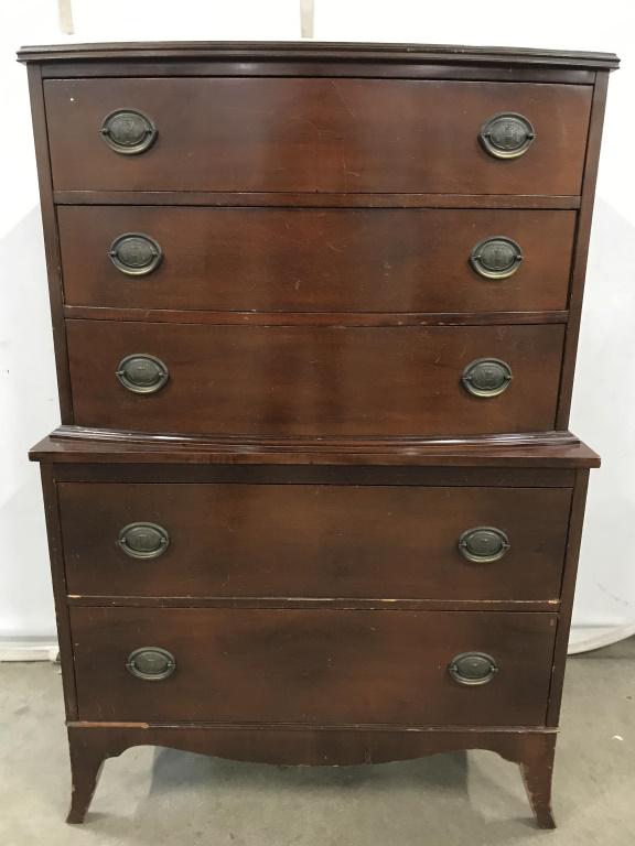 Vintage 5 Drawer Wooden Highboy Dresser: Dresser has 5 drawers. Piece is chocolate toned. Drawers each have 2 oval shaped gold toned handles. Piece has hand dovetailed drawers. Vintage dresser, chest of drawers, home furnishings, bedroom fur