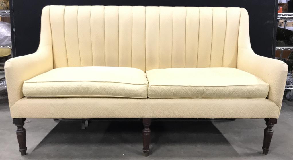 Gold Toned RALPH LAUREN Loveseat: Underneath cushion has tag which reads RALPH LAUREN. Piece has 5 carved wooden legs. Upholstery is gold toned with diamond pattern & leaf & vine detail. Ralph Lauren couch, Ralph Lauren sofa, Ralph La