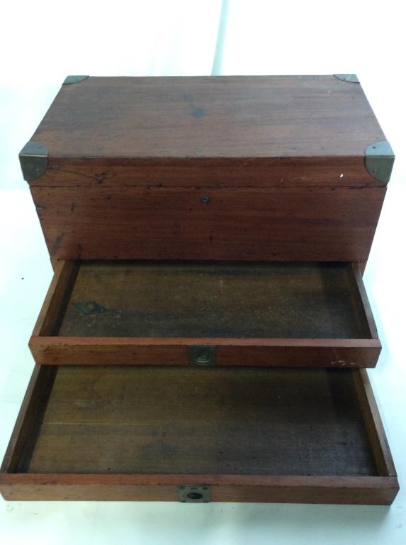 Vintage Mahogany Jewelry Box: Dovetail woodwork, brass corner protectors & Hardware, 18 x 10 x 10 3/8 in. Top hinges open to reveal large storage area, 4.5 in deep. Chain to hold up hinge door needs re fixing. Two lower drawers pu
