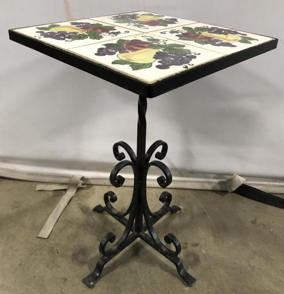 Vintage Metal Painted Tile Top Side Table: Table is metal with tile top. Piece has c curve detail near base. Piece has painted fruit detail on tile top, Possibly Hand Painted. Outdoor table, patio table, side table, tile top table, painted sid