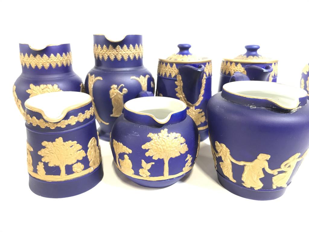 Set 14 Dudson Bros. Coronet Earthenware, England: Jasperware pottery, Embossed painted gilt neoclassical designs and cobalt blue, set of pitchers, creamers, teapots, candlesticks. All impressed with ‘Dudson Brothers Hanley England F’ & stamped wi