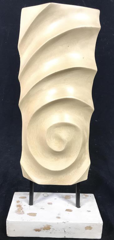 Carved Wooden Sculpture W Base: Sculpture is tan toned and wooden. Base appears to also be wooden. Piece measures approx 13.5 inches tall 6 inches wide, 3 inches deep. sculpture, decorative arts and accessories, home decor, interior
