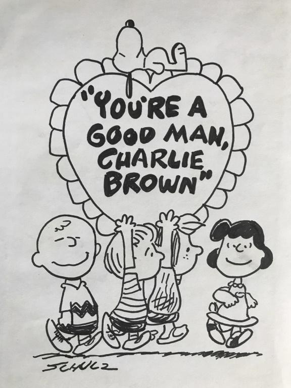 Signed Ink On Paper Snoopy After CHARLES SCHULZ: Signed Ink On Paper Depicting The Peanuts Gang holding up a heart with Snoopy lying on top, inside the heart reads ‘You’re A Good Man Charlie Brown’, Signed Schulz under lower left edge of drawi