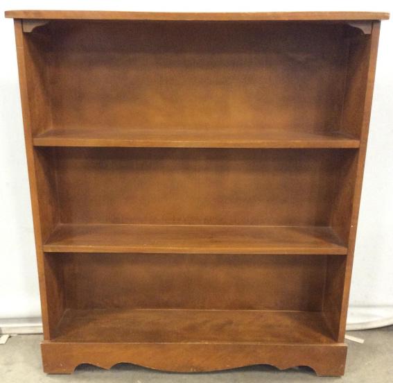Vintage 2 Shelf Carved Wooden Bookshelf: Bookshelf is wooden. Piece has 2 shelves. Shelf is beige toned. Piece measures approximately 40 inches tall 36 inches wide 8 inches deep. Piece contains some wear and scratches. bookshelf, shelf. disp