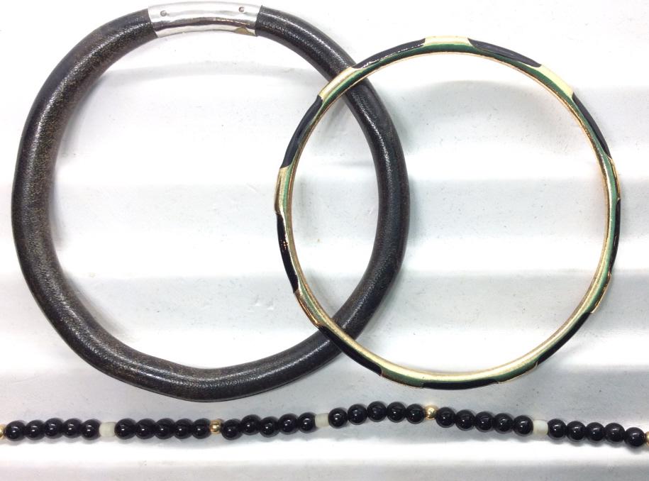 Lot 3 Black & Gold Tn Bangles, Bracelet: Enameled Bangle, alternating bar pattern, 2.5 in. diameter. Artisanal Hammered silver tone accent bangle, 2.5 in. diameter, .25 in. width. Onyx Seed bead bracelet, spring ring, 7 in. Bracelets, Fashio