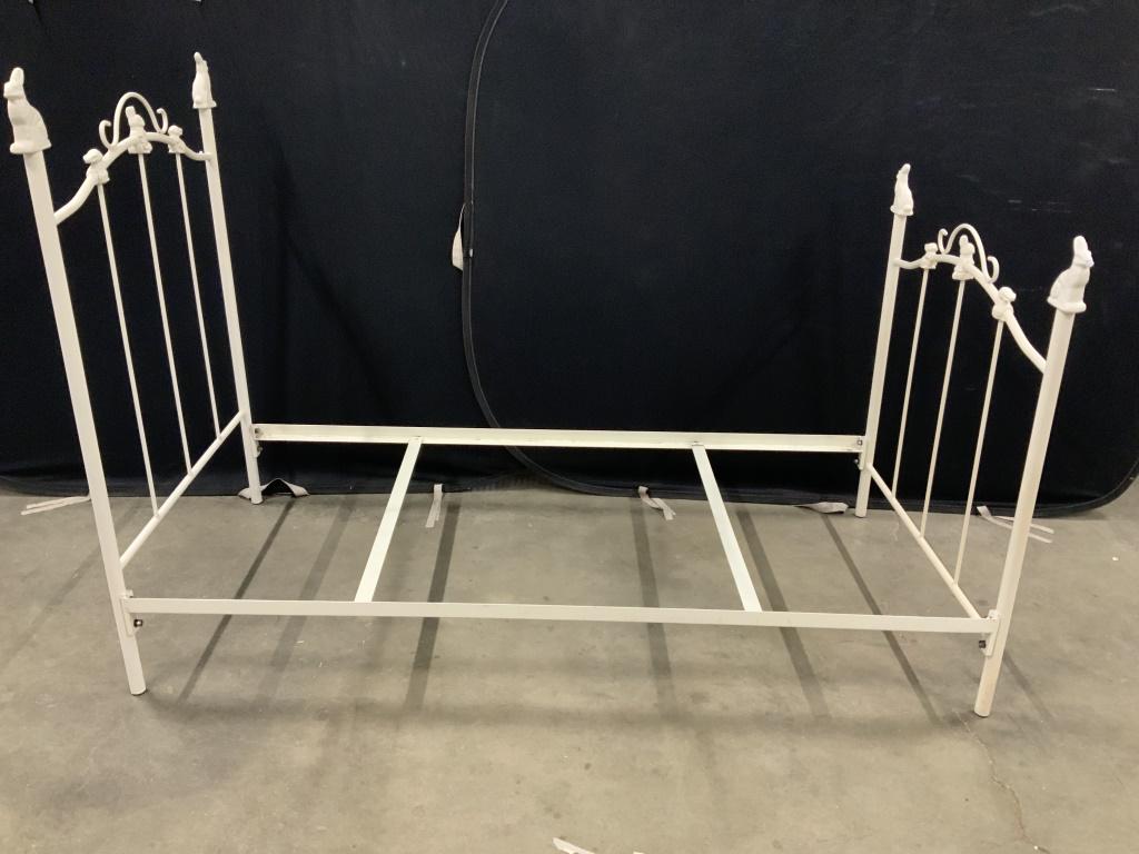 Vintage Metal Twin Size Bed Frame: This is a vintage bed frame, the frame fits a twin sized bed. The piece is decorated with rabbits on the headboard and footboard. The piece Has been colored white. The piece measures approx 54.25 inch