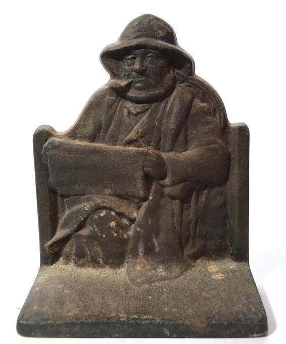 Pair Vintage CAPE COD FISHERMAN BOOKENDS: Backside of each are marked CAPE COD FISHERMAN COPYRIGHT 1928. Bookends are possibly brass. Each piece measures approximately 5.5 inches tall 4.5 inches wide. Vintage bookends, fisherman bookends, Met