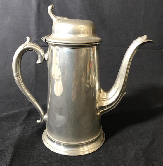 Vintage Pewter Tea Kettle, England: This is a vintage Pewter tea kettle, the piece is made in England. The lid is hinged and attached to the kettle. The piece measures approx 9.12 inches H and 9.8 inches W. There is minor wear present d