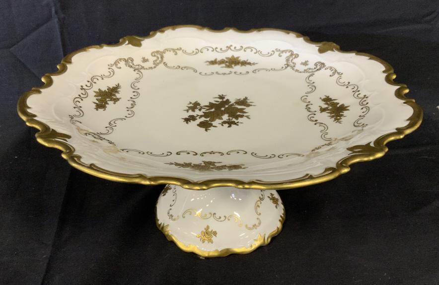 Vintage Porcelain Tazza W Gilt Scroll Design: Vintage Porcelain Ceramic Cake Stand W Gilt Scroll edges and floral, leaf and scroll design, marked on underside with crown topped gold R and green olive leaf wreath, measures approximately 12.75 inch