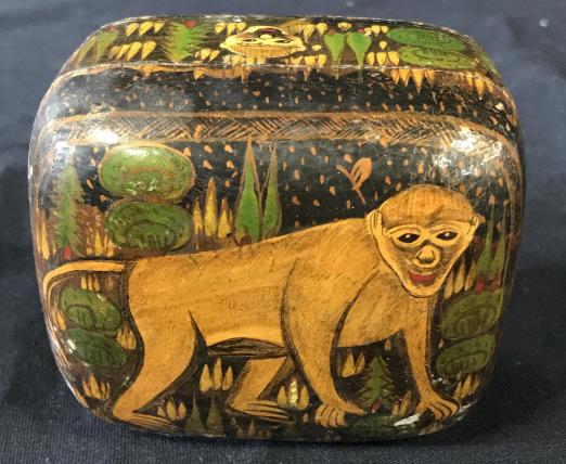 Vintage Hand Painted Wooden Trinket Box, India: This is a vintage, handpainted, Trinket Box. The piece has been painted to depict a several monkeys covering the box. The label on the underside reads Kashmir, India. The piece measures approx 1.6 inc