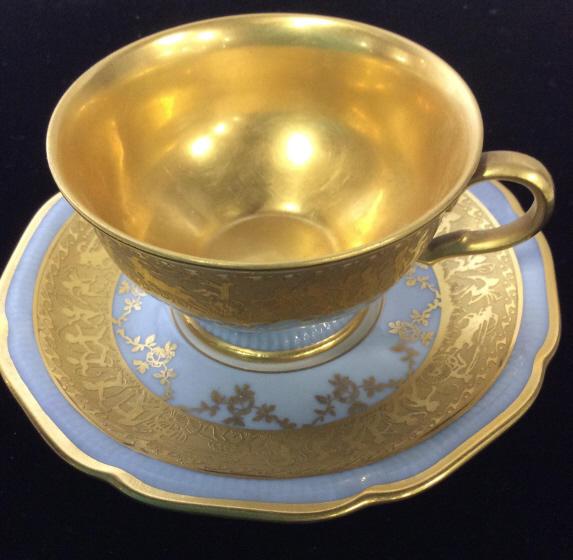 DW Fine Porcelain Tea Cup & Saucer, Germany: DW Fine Porcelain Tea Cup & Saucer, Germany. Marked on underside DW. tableware, individual tea service, tabletop accessories. teacup measures approx 3 in by 2 in, saucer measures approx 5 in in dia.