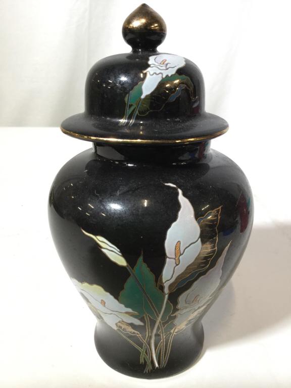 Asian Porcelain Ginger Jar W Lid: Ginger jar has petite size. Piece is black toned with multi toned floral and leaf detail. Jar includes lid. Measures approx 6 inches tall 3.5 inches wide. asian arts and crafts, decorative arts and ac