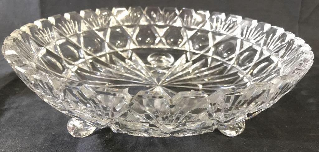 Cut Crystal Footed Toothed Bowl: Bowl is cut crystal. Rim of piece is toothed. Piece has 3 curled feet. Piece measures approx 10.5 inches wide 3.5 inches tall. crystal accessory, home accent, shelf piece, tableware, tabletop accessor