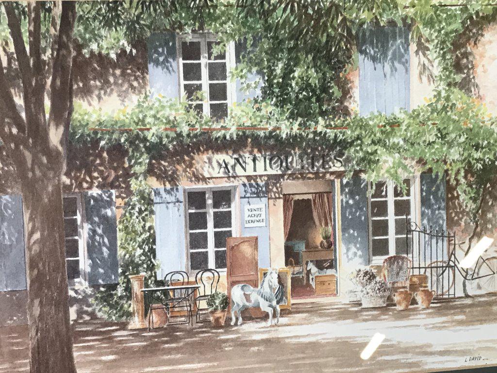 L. David Frant Print, Exterior Of Antiques Shop: App 19 x15 in. Doubled matted under glass. Signed print lower right, L. David. Thin gilt wood frame with moss green line between App 19 x15 in. Doubled matted under glass. Signed print lower left, L. 