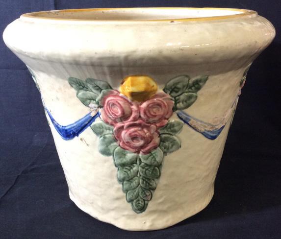 Vintage Hand Painted Ceramic Planter: Planter appears to Ben Hand Painted and handmade. Piece appears to be Vintage. Contains multi toned floral and leaf detail. Piece measures approx 9.5 inches tall 12.5 inches wide. Piece contains evide