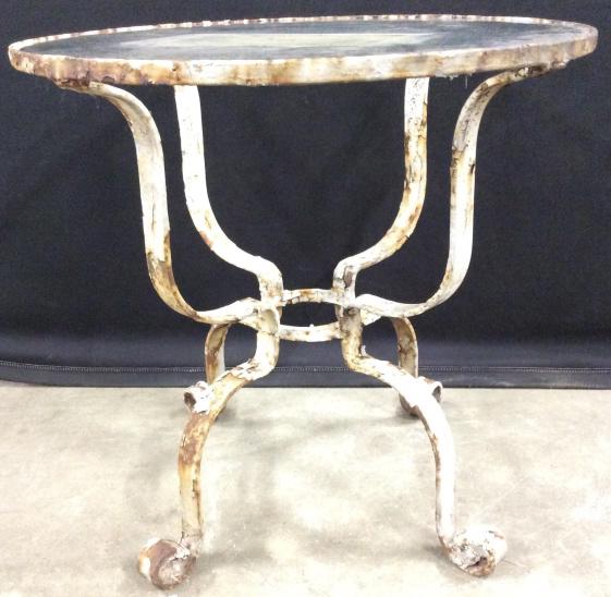 Vintage Outdoor Metal Side Table w Glass Top: Table is metal. Piece contains circular glass top. Table has c curve style feet. Side table, end table, outdoor table, vintage outdoor table. Piece measures approximately 18 inches tall 18.5 inches wi