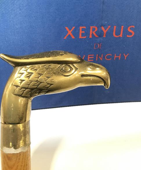 Luxury Lot, Givenchy Umbrella, Brass Head Cane: Navy Blue Givenchy Rain Umbrella, Givenchy Tag, Handle 25 in long, app 39 in wide umbrella cover. Reads ‘XERYUS DE GIVENCHY PARIS in red letters on ext. Brass Falcon Head Walking cane. Maple wood an